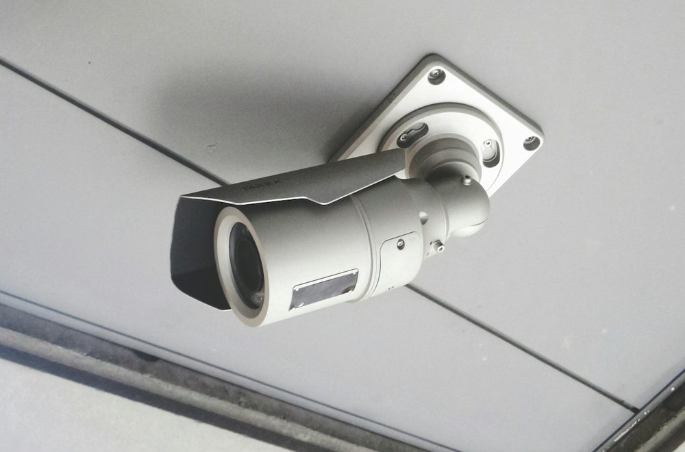 Bullet CCTV camera mounted on a store ceiling